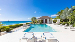 Deluxe 4BR beachfront villa with sunset views
